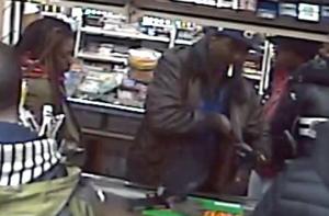 Police release images of suspects in slaying of man inside St. Louis convenience store