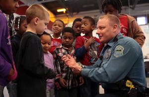 Police officers provide early Christmas for Ferguson kids