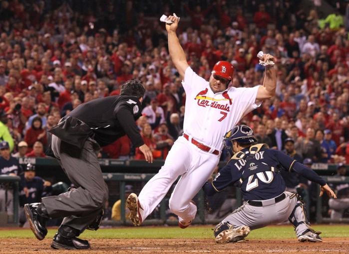 Holliday&#39;s dash for winning run lifts Cards : Sports