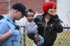 Relative of shooting victim cries at scene