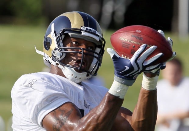 a image. July 29, 2010 -- Rams rookie tight end Fendi Onobun hauls in a pass Thursday 