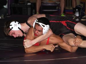 Triad battles past Glenwood to earn state berth