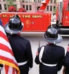 St. Louis Fire Department truck as firefighters look on