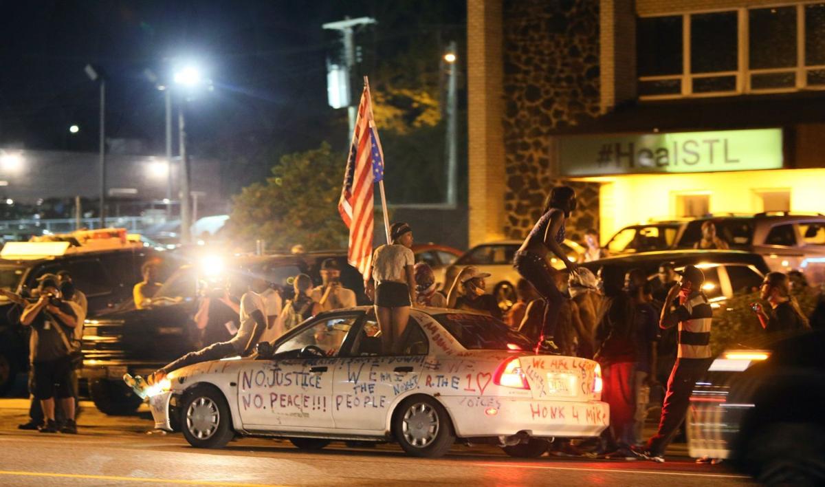 Ferguson protesters block rush-hour traffic on I-70 and get arrested