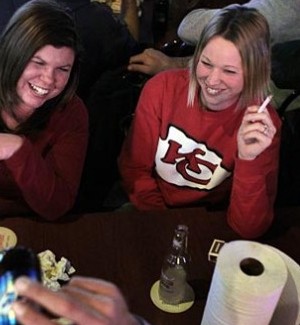 Smokers inside Hot Shots Sports Bar & Grill in Fenton