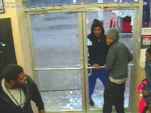 Surveillance video of looting at gas station after grand jury announcement