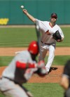 Chris Carpenter pitches against the Reds