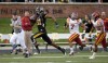 Mizzou's Danario Alexander runs away from Iowa State defenders