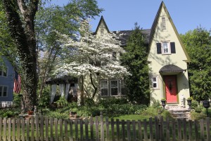 French accents, outdoor living space enhance storybook cottage 