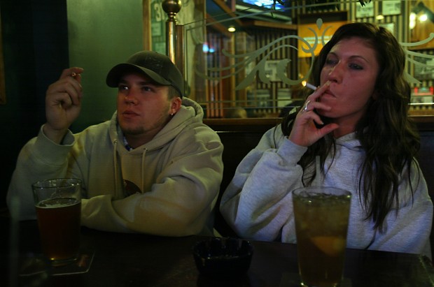 Fewer adults  are smoking, as rate dips to 18 percent, report says