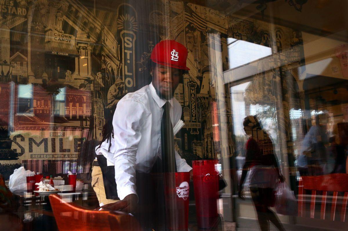 Subject of iconic Ferguson photo juggles work, family