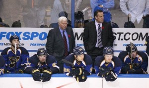 Hitchcock behind bench
