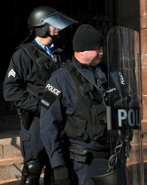 St. Louis police say they'll discipline officer who wore 'Wilson' name tag at City Hall protest