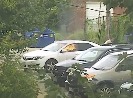 Person at scene of car fire