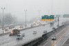 Snow falls on Interstate 64