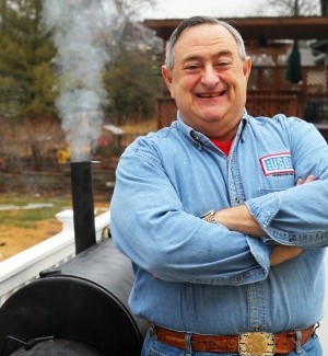 Pit master keeps barbecuing, whatever the weather  