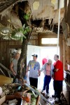Storm blows tree down on top of home in Jennings