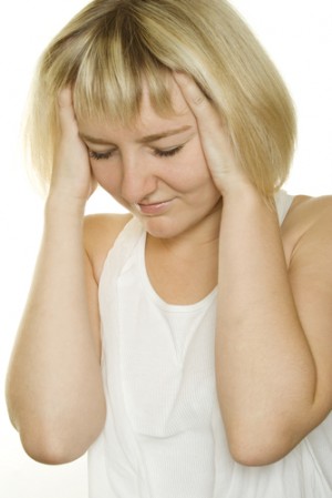 Women are more stressed than men by own displays of defensiveness