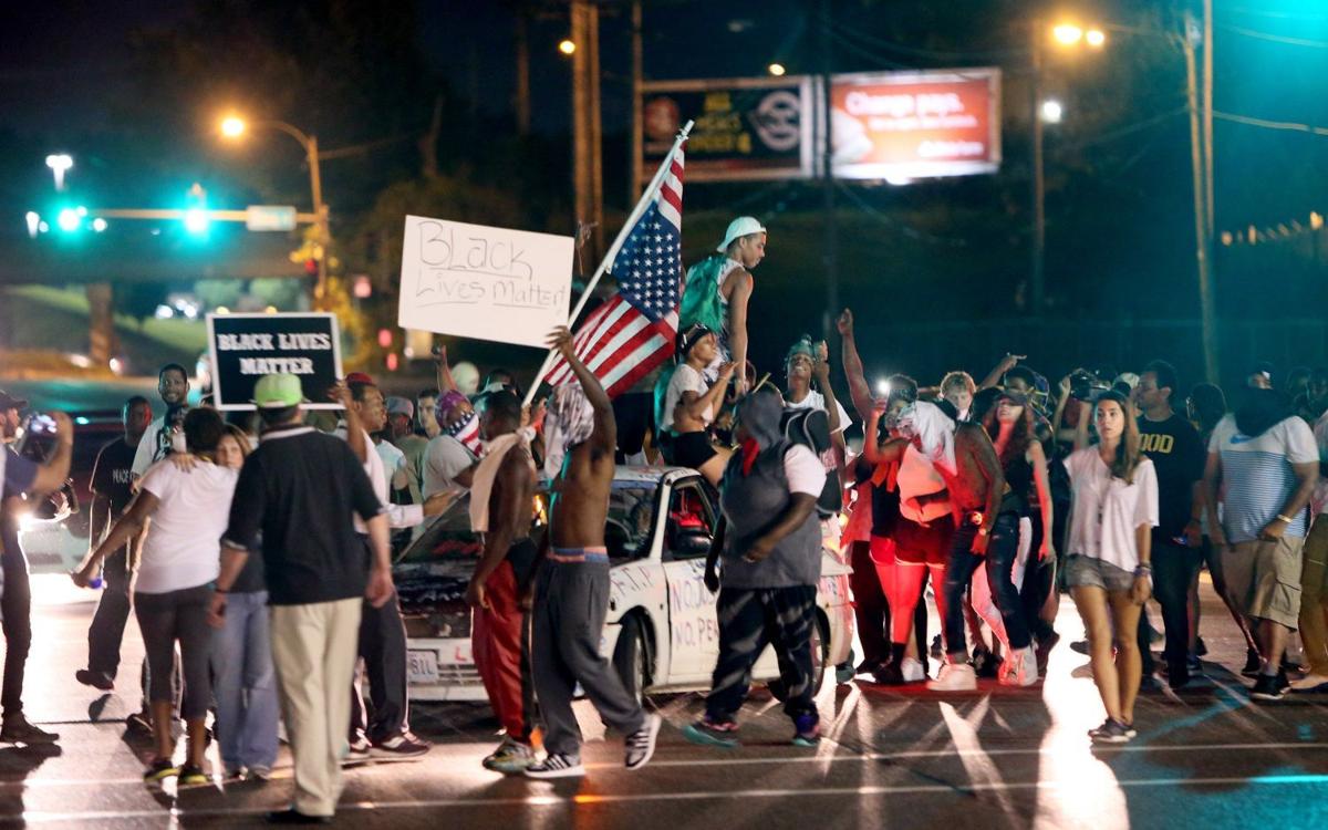 Ferguson protesters block rush-hour traffic on I-70 and get arrested