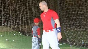 #10 Albert Pujols and son, A.J., in the cage
