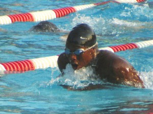 SUBMITTED PHOTO Ferguson swimmer Amir Paschal was one of the standouts at the recent Municipal Swim League Conference North meet this past week. Paschal won three gold medals and broke a 15-year-old record in the 50-yard butterfly.