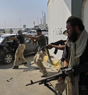 Libyan rebels fight pockets of resistance  