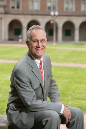Wash U. graduation chief hangs up mortarboard