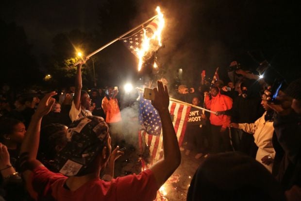 Violence erupts after vigil at Shaw shooting scene in St ...