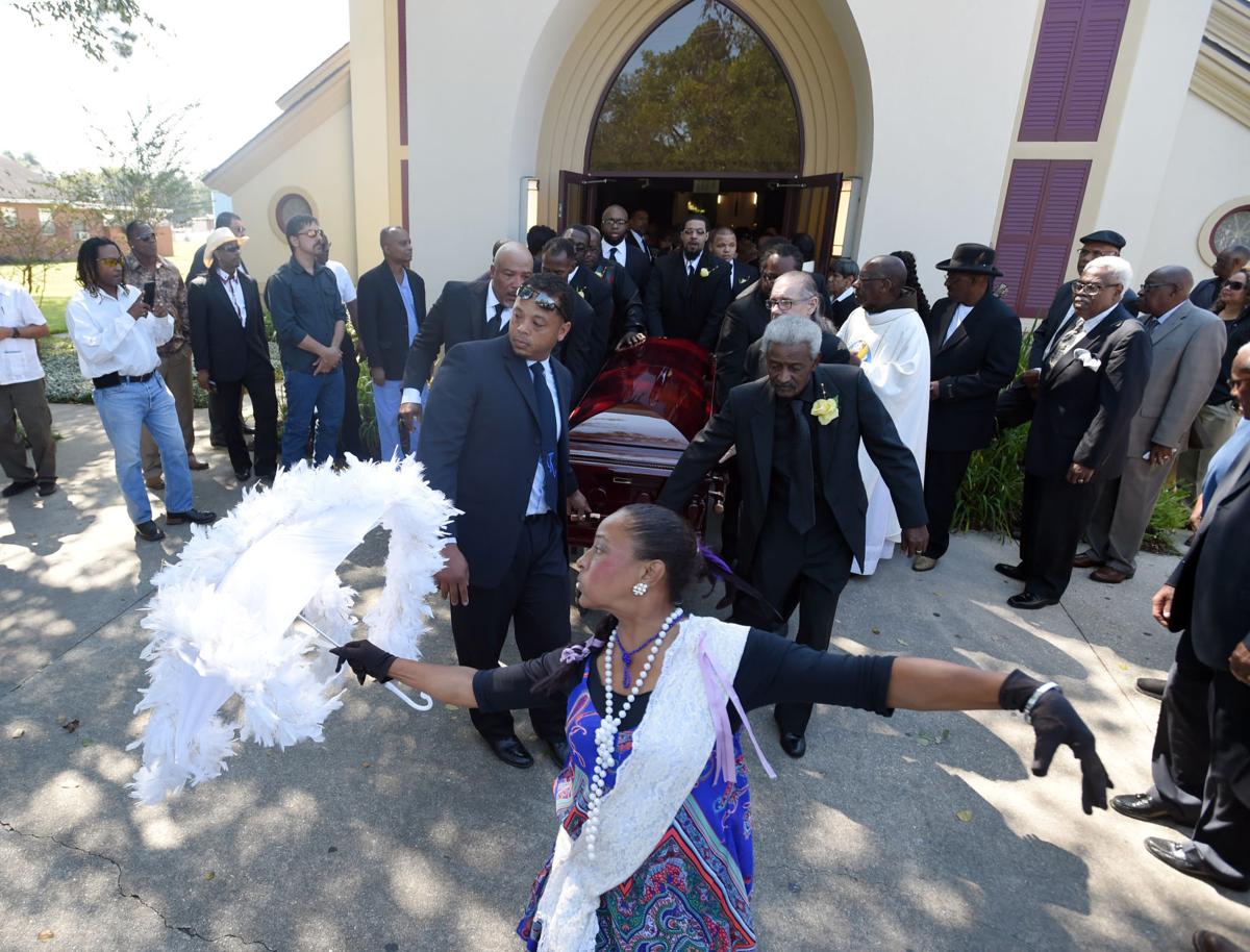 Photos Family, Friends, Musicians attend funeral for