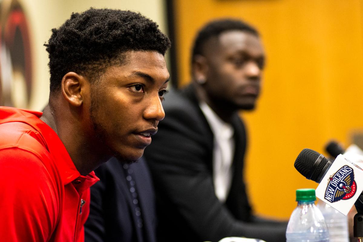 new orleans pelicans players elfrid payton, left, and julius