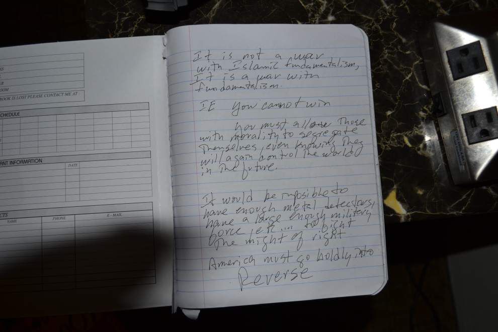 Cryptic phrases, 'Trainwreck' mentions, more revealed in Lafayette theater shooter's journal, motel photos _lowres