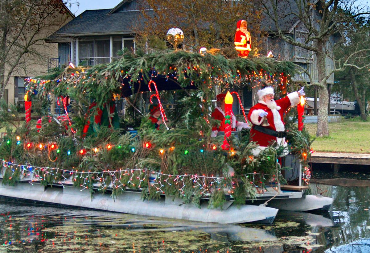 Bayou Christmas Slidell 2022 Santa on the Bayou floats through Coin du Lestin in Slidell St