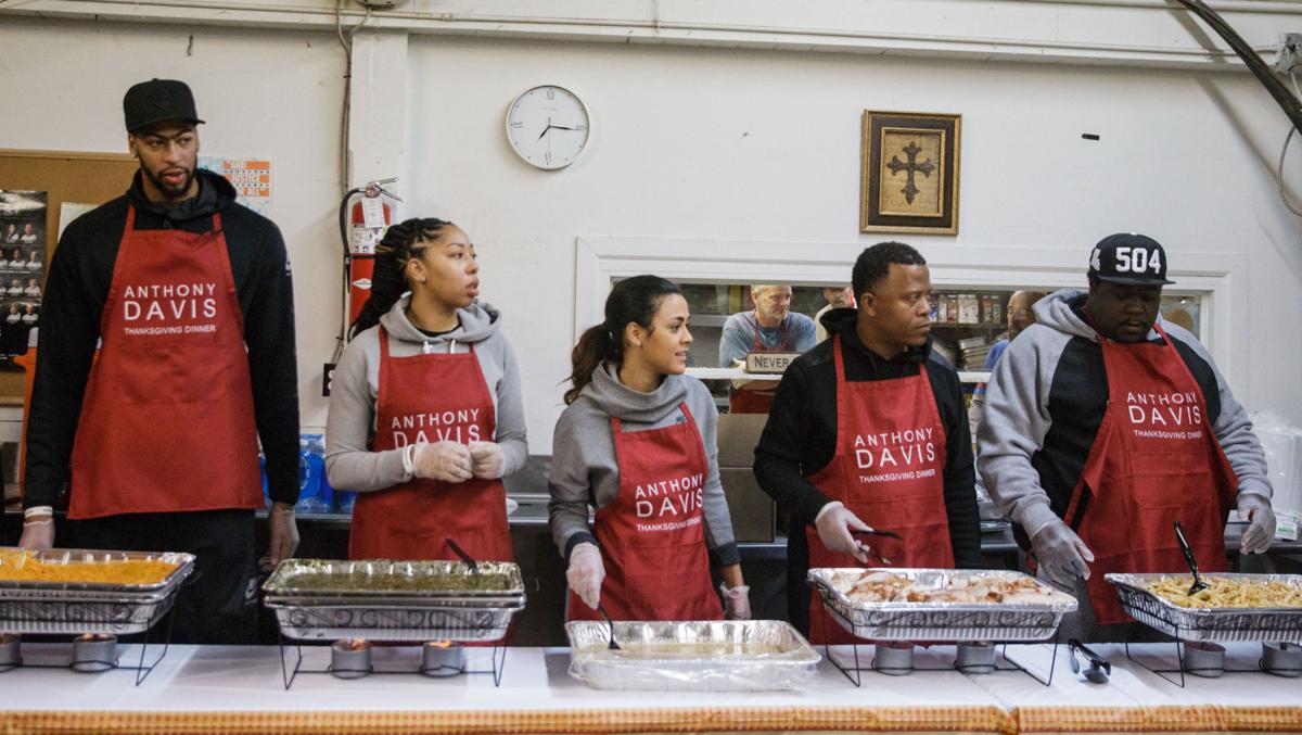 New Orleans Pelicans star Anthony Davis serves ...