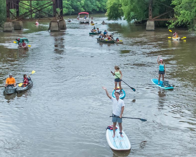 Parade of canoes and kayaks shows off Vermilion River and its unique culture - The Advocate