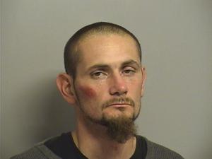 Bicyclist police say was carrying guns, drugs arrested after short pursuit early Saturday