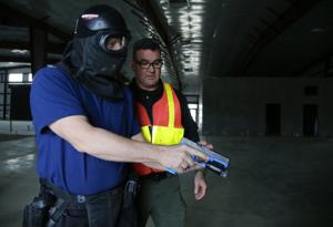 Outreach event offers hands-on experience of how officers handle tense situations