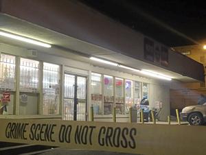 Suspect sought in severe beating of man outside downtown convenience store