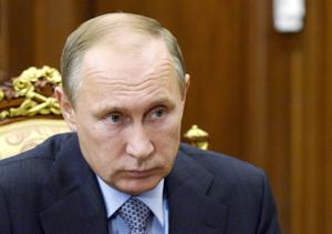 Metrojet crash cause still unclear but could benefit Putin