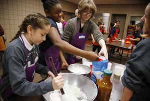 Tulsa fifth-graders learn about Holocaust, prepare food from recipes shared by survivors