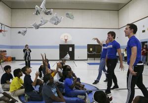 'Newsies' cast members use music, dance to inspire Tulsa elementary schoolers