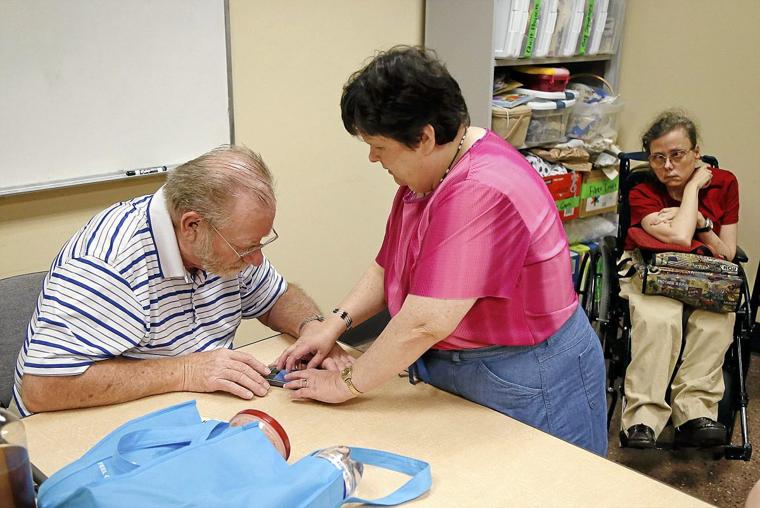 Tulsa woman teaches the blind how to use iPads