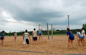 Sand volleyball players, supporters gather to celebrate Helmerich Park's 25th anniversary
