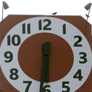 Historic Meadow Gold sign finally gets its clocks back