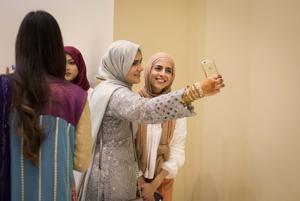 Area Muslims celebrate end of Ramadan fast as thousands gather for Eid service