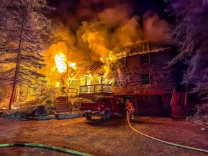 Two injured, dog dead, cat missing following Georges Mills house fire