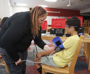 Manchester middle schoolers learn nursing skills through Elliot Health program