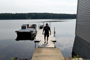 UNH crews search Lake Massabesic for missing WWII B-17 ball turret