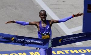 Athletics-Kenya's John Korir shatters Boston Marathon course record