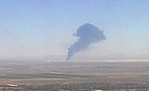 Smoke rises from Edwards Air Force Base after the crash of a U.S. Air Force B-52 bomber aircraft in Edwards, California, U.S., June 15, 2026, in a still image from an ALERTCalifornia fire surveillance camera.