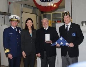 Douglas Wyman Sr. accepts Purple Heart for Fred Wesley Wyman